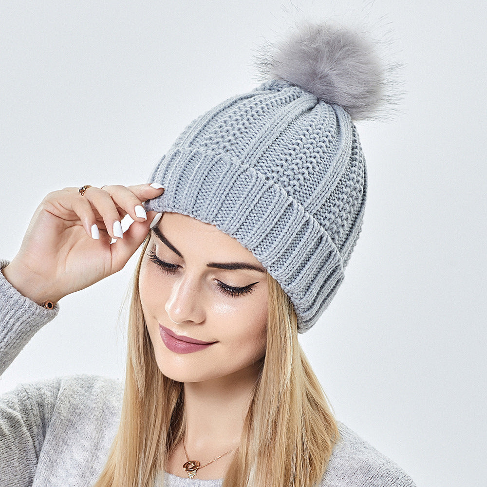 Satin-Lined Knit Beanie with Faux Fur Pom Pom – Stylish & Protective Winter Hat ❄️✨